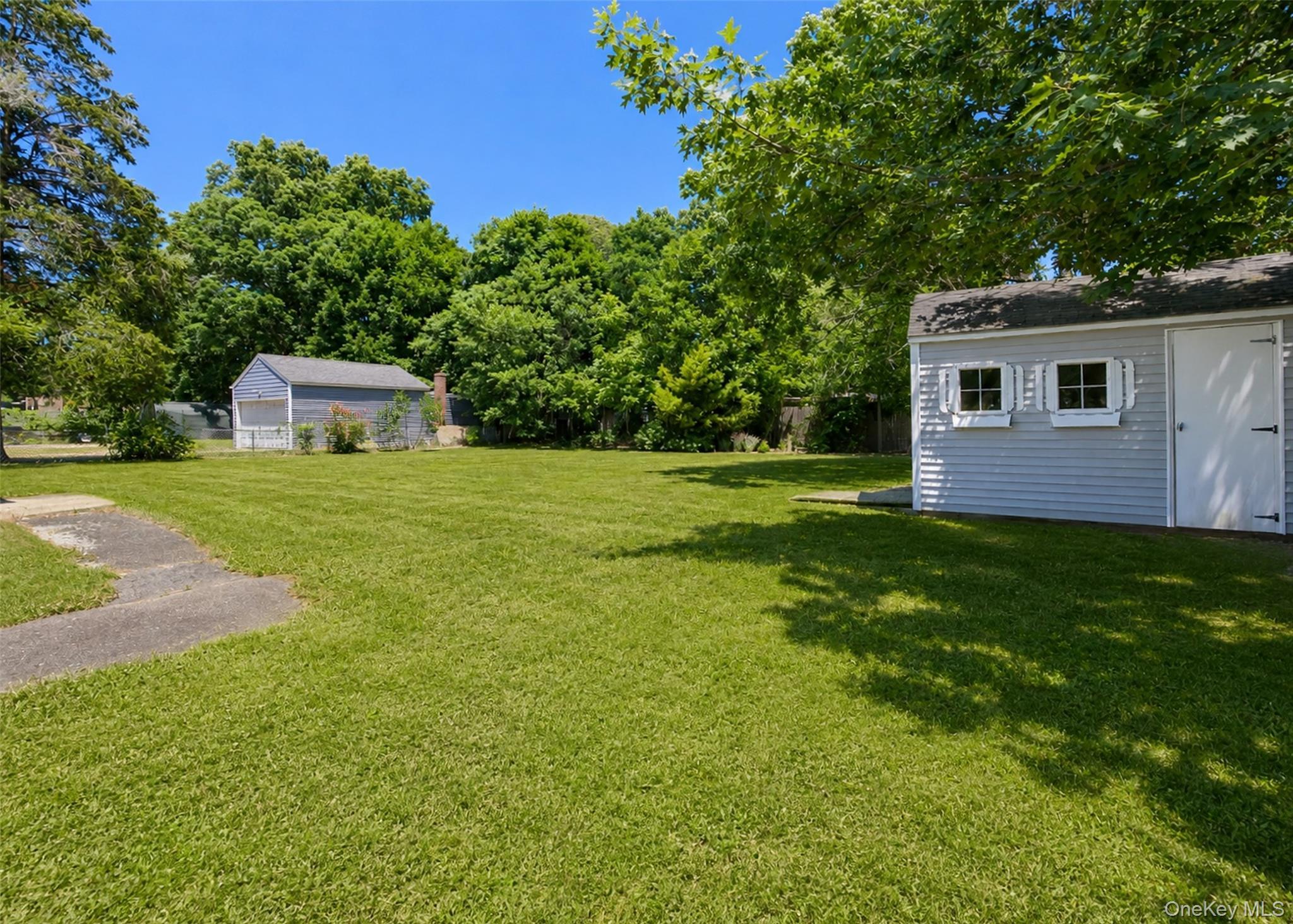 Single Family Mcgaw Avenue  Suffolk County, NY 11755, MLS-1017116-21