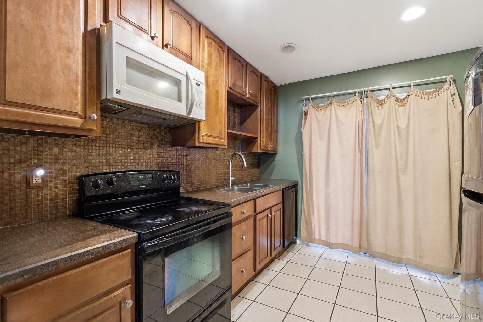 Single Family Ralph Avenue  Suffolk County, NY 11717, MLS-1024438-12