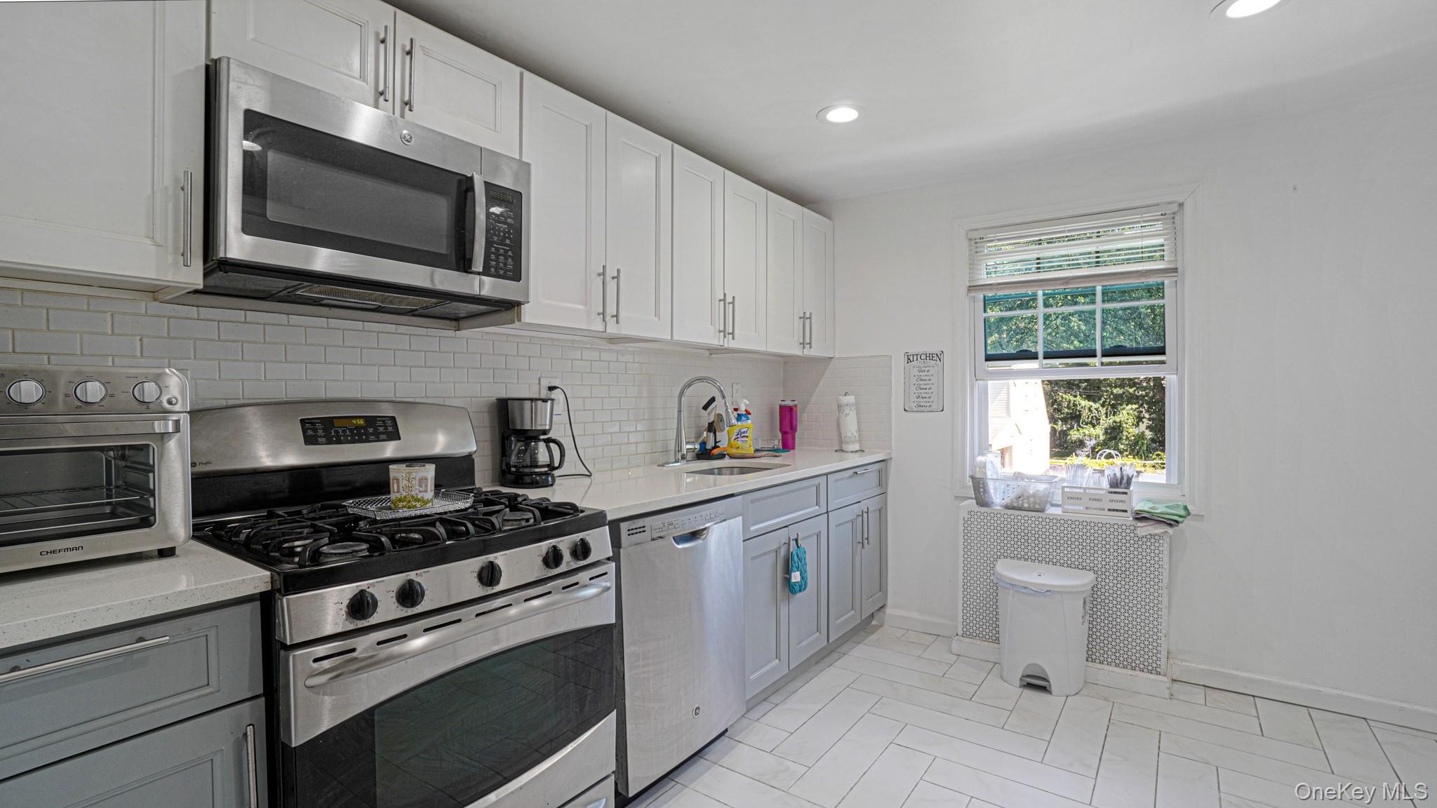 Single Family S Montgomery St Nassau County, NY 11580, MLS-1024816-24