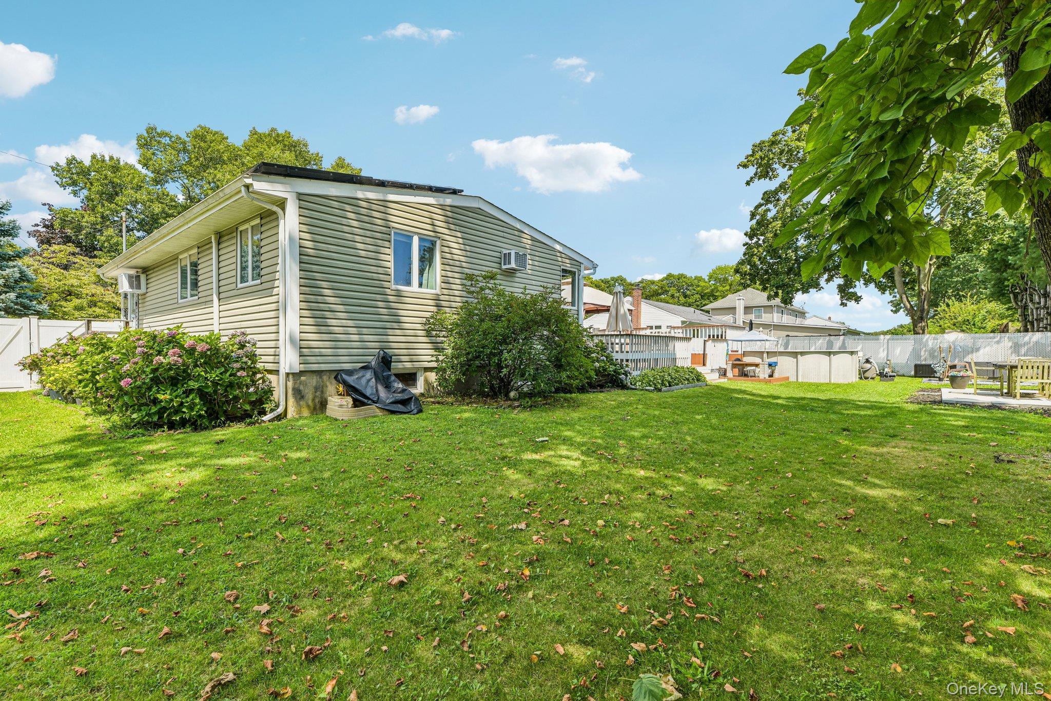 Single Family Beecher Avenue Suffolk County, NY 11730, MLS-1038661-23