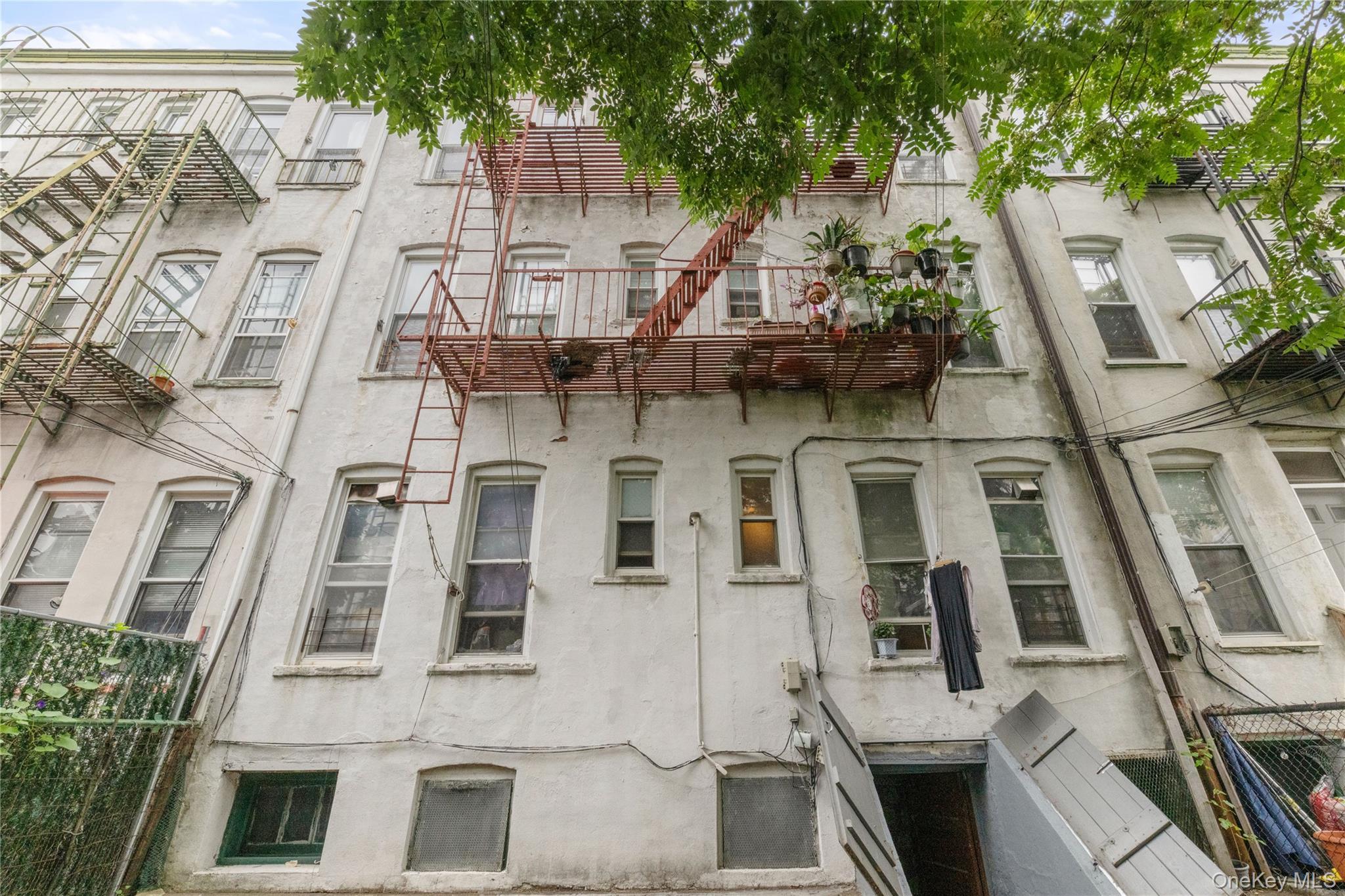 Single Family Putnam Avenue Queens, NY 11385, MLS-1042679-16