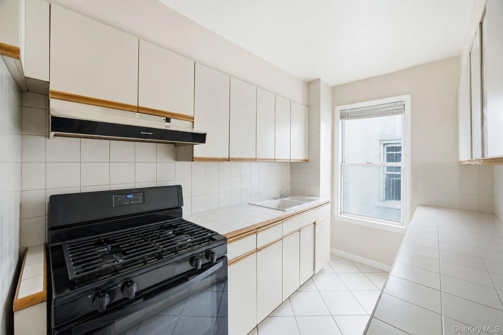 Single Family Ditmars Boulevard Queens, NY 11105, MLS-1047023-13