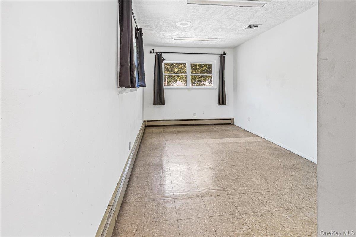 Single Family Stewart Road  Queens, NY 11364, MLS-1048593-15