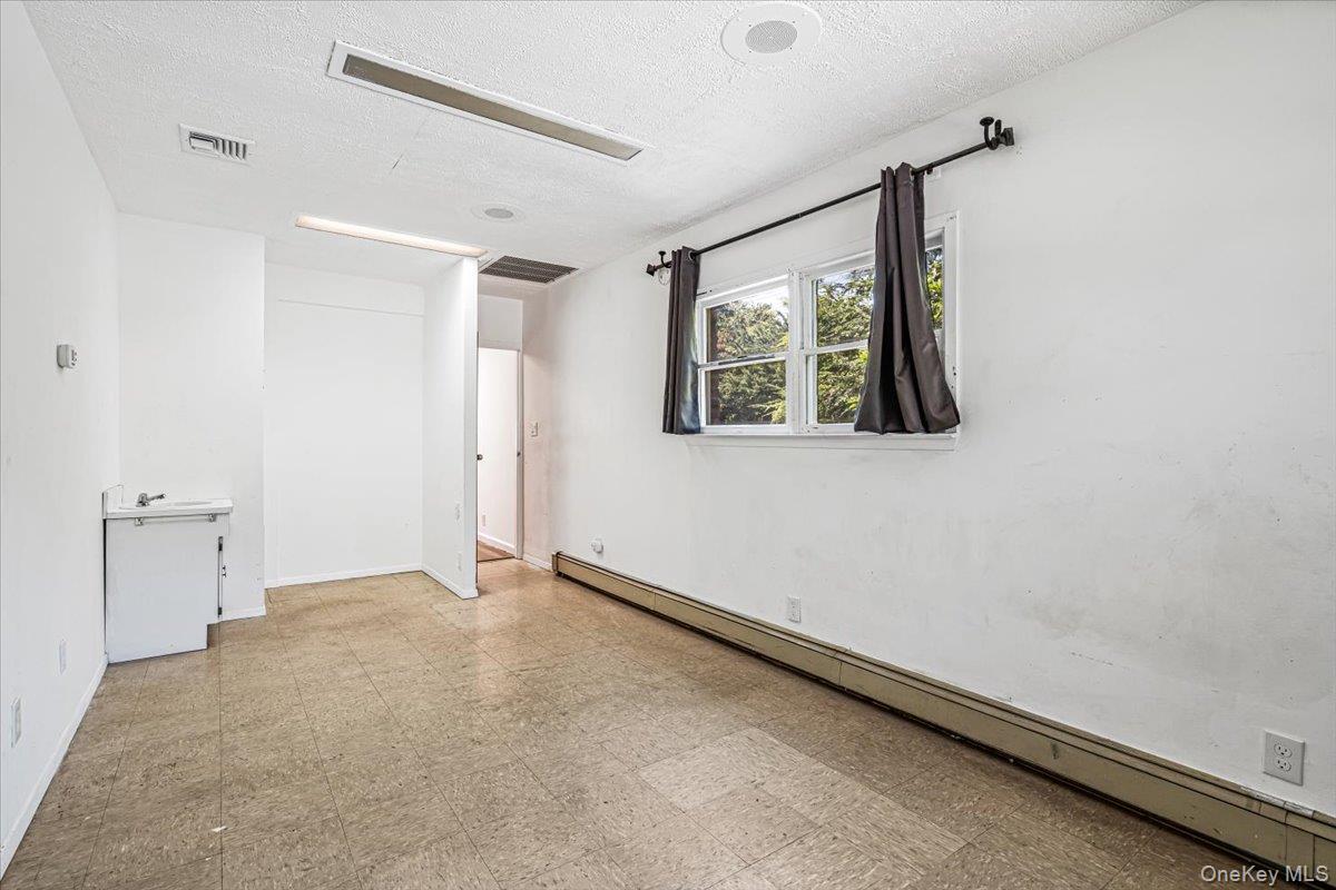 Single Family Stewart Road  Queens, NY 11364, MLS-1048593-16