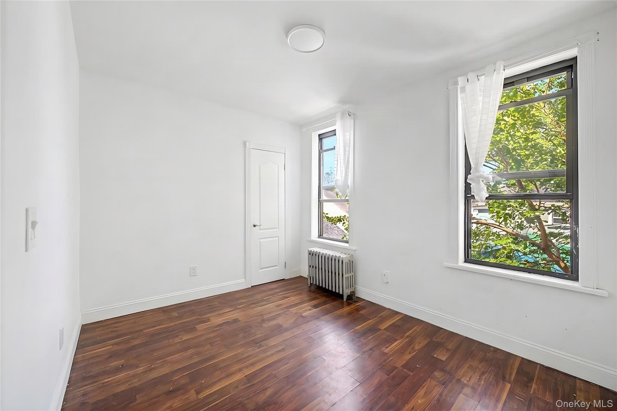 Single Family Liberty Avenue Queens, NY 11419, MLS-1050040-21