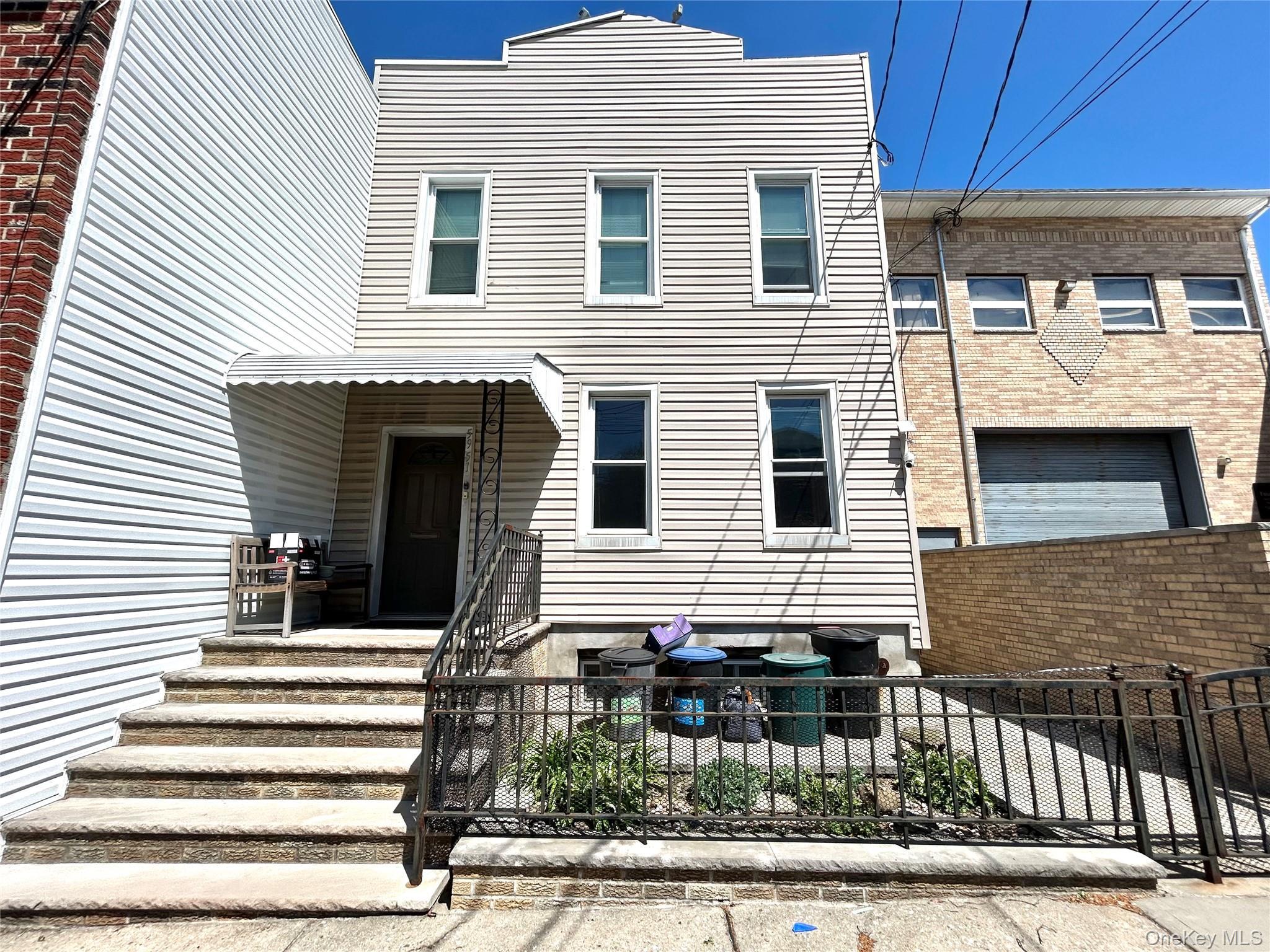 Single Family 56th Drive Queens, NY 11378, MLS-1052575-2