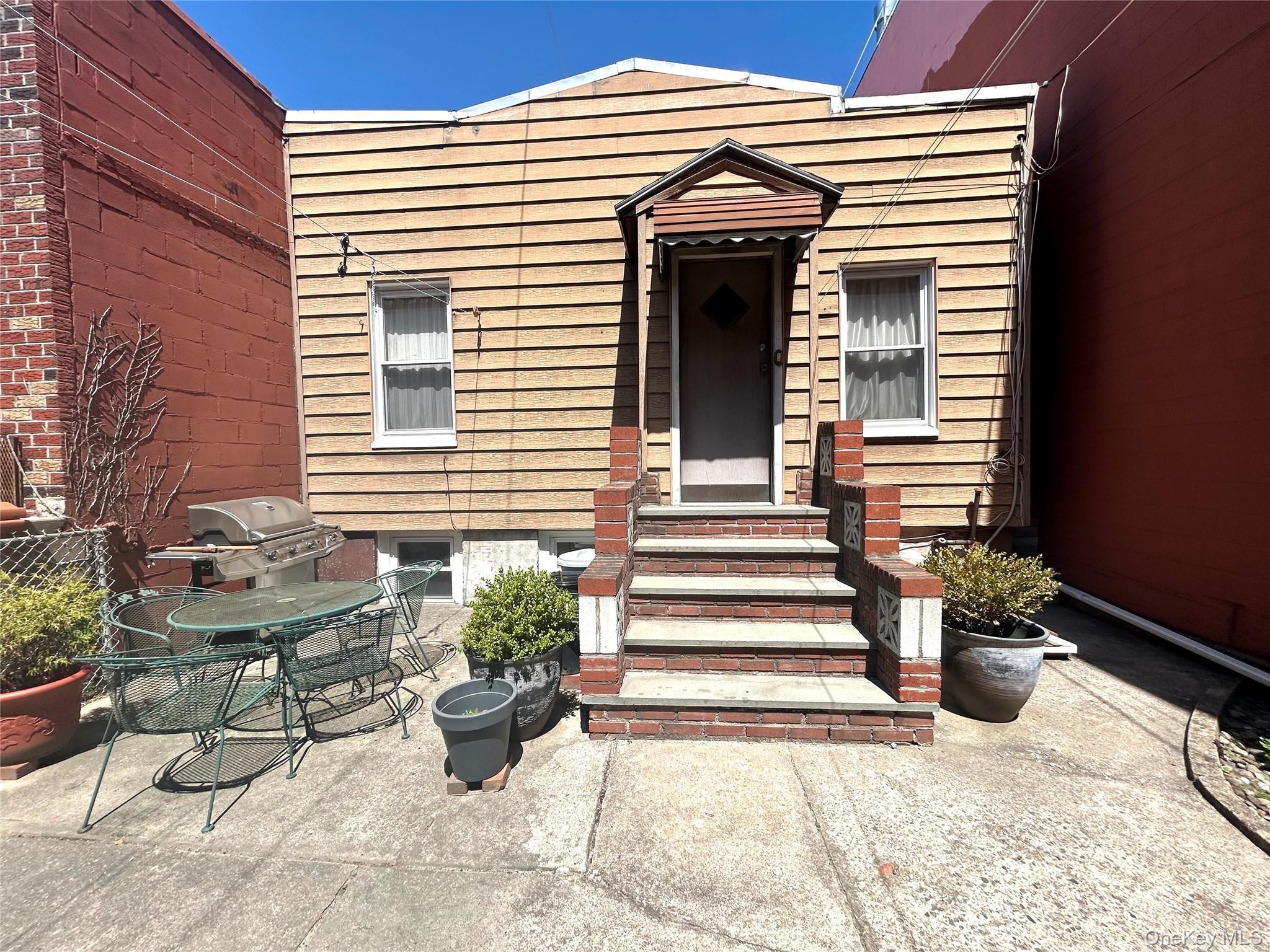 Single Family 56th Drive Queens, NY 11378, MLS-1052575-24