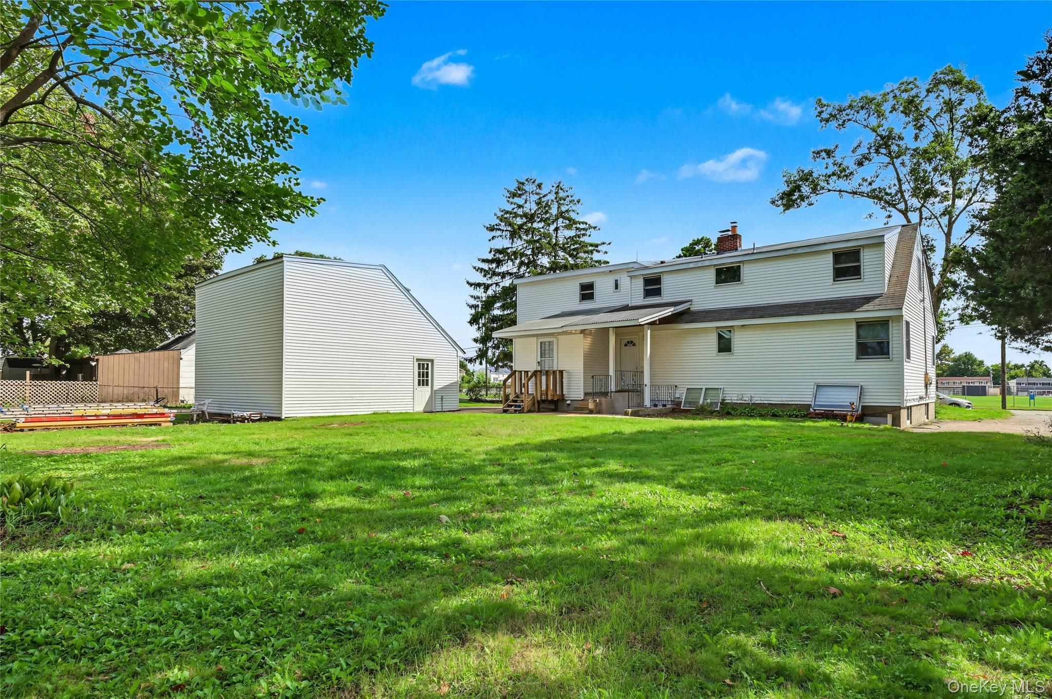 Single Family Tooker Avenue  Suffolk County, NY 11704, MLS-1055529-3