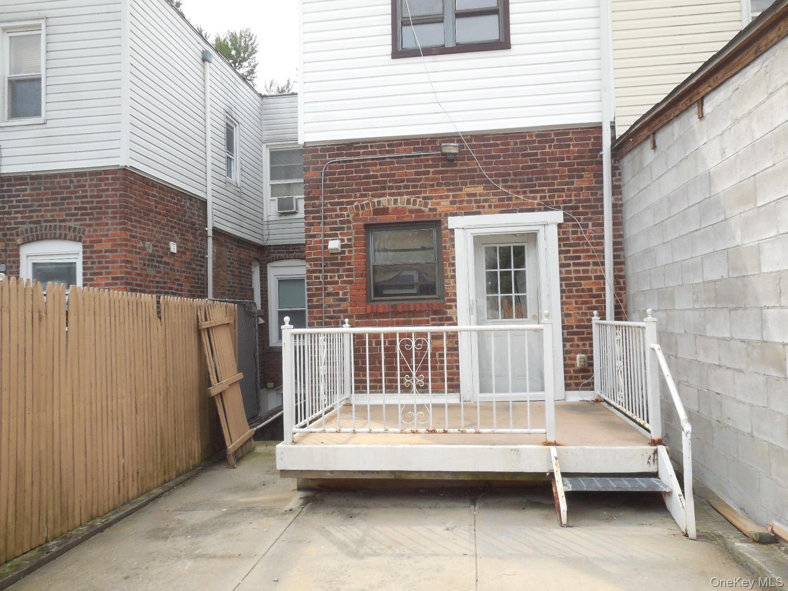 Single Family Mcintosh Street Queens, NY 11369, MLS-1056793-2