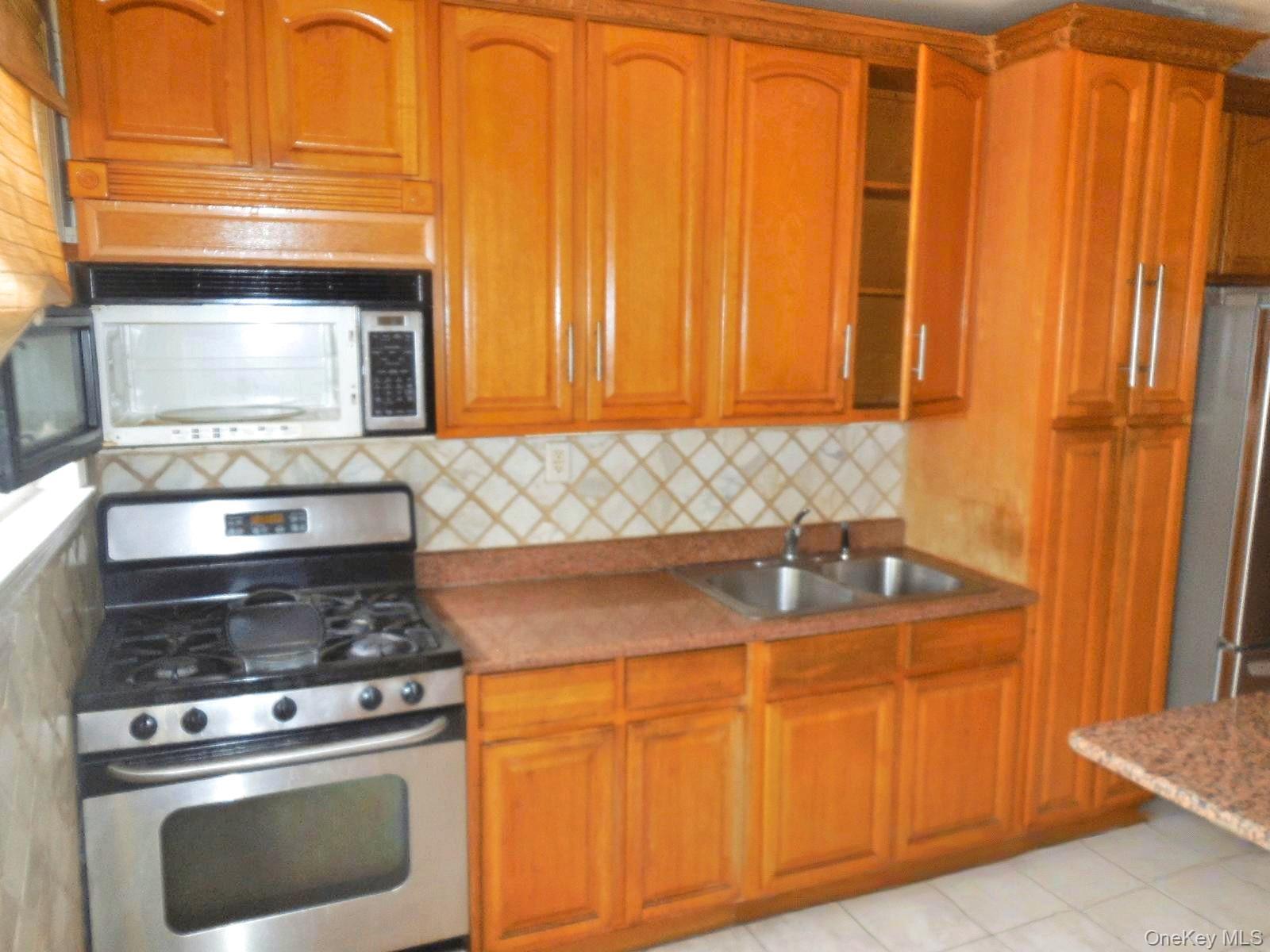Single Family Mcintosh Street Queens, NY 11369, MLS-1056793-8