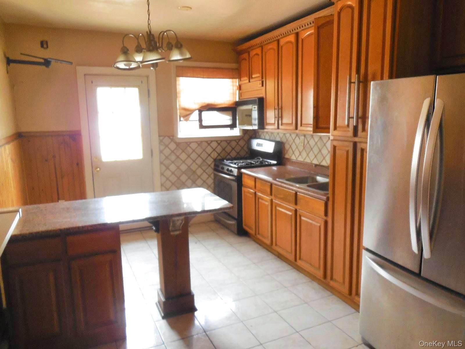 Single Family Mcintosh Street Queens, NY 11369, MLS-1056793-9