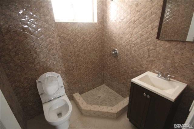 Single Family 55th Drive Queens, NY 11378, MLS-1062093-2