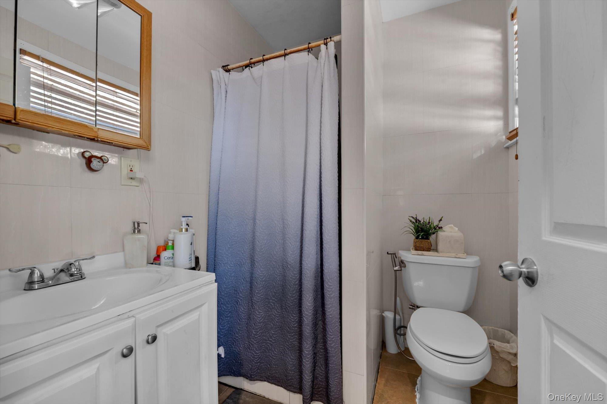 Single Family Powells Cove Boulevard Queens, NY 11357, MLS-1062273-11