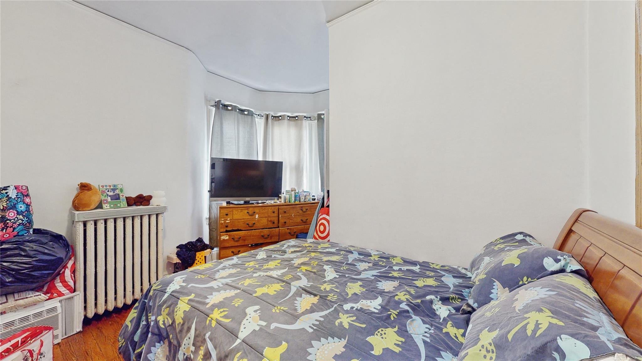 Single Family Buell  Queens, NY 11369, MLS-815983-22