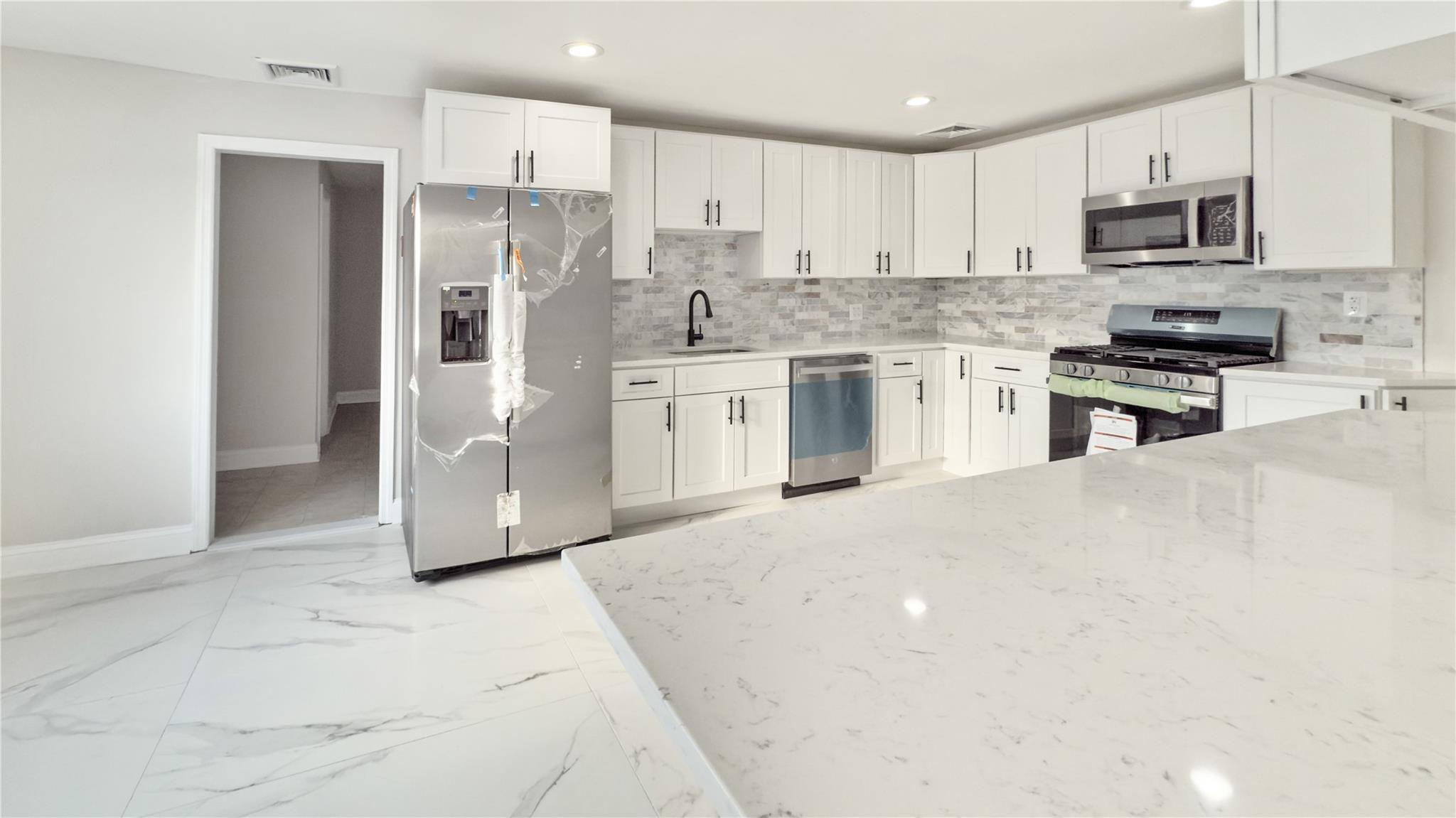 Single Family Roosevelt  Nassau County, NY 11520, MLS-831682-23