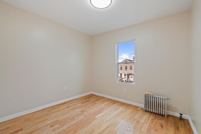 Single Family Mcintosh  Queens, NY 11369, MLS-838327-22