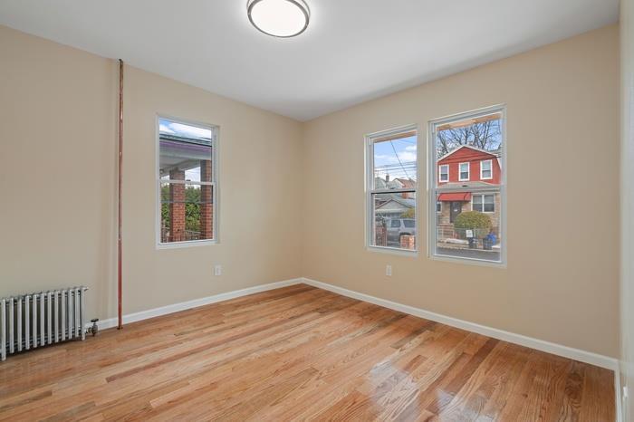 Single Family Mcintosh  Queens, NY 11369, MLS-838327-23
