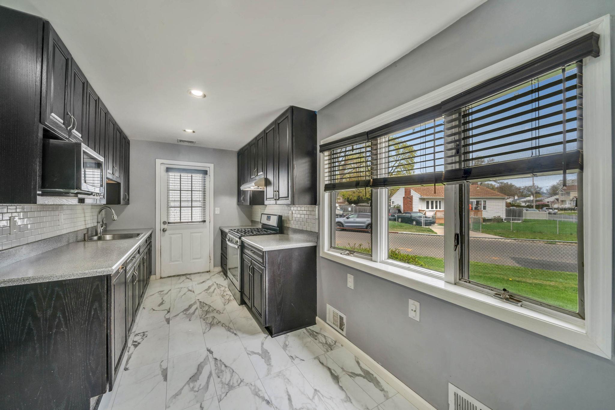 Single Family Front  Suffolk County, NY 11717, MLS-850808-12