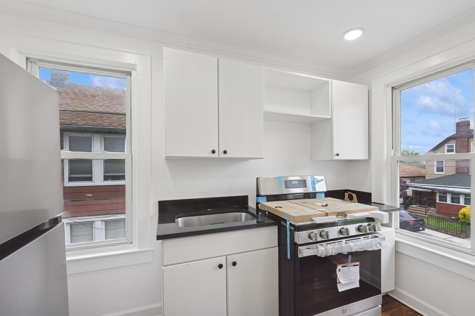 Single Family Buell  Queens, NY 11369, MLS-856204-21