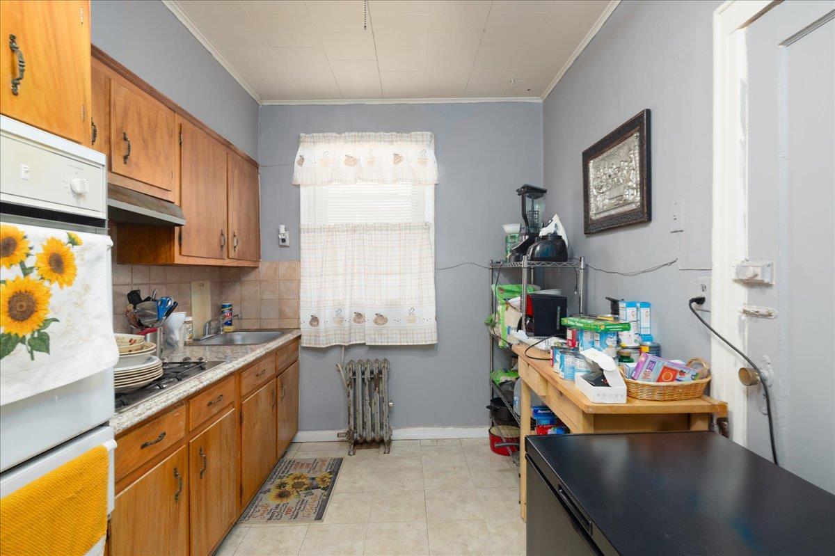 Single Family 69th  Queens, NY 11378, MLS-857607-11