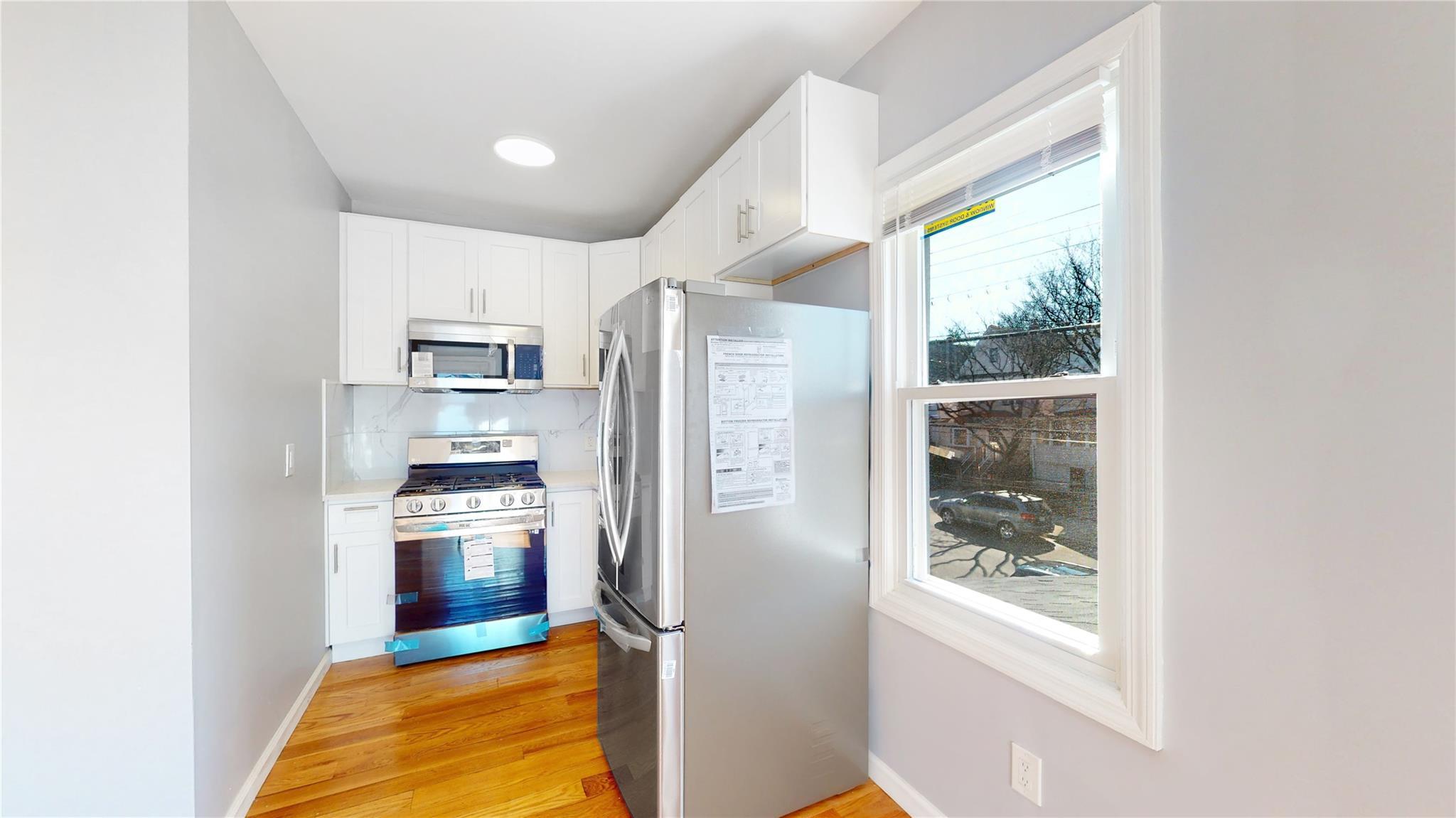 Single Family Liverpool  Queens, NY 11435, MLS-859506-14