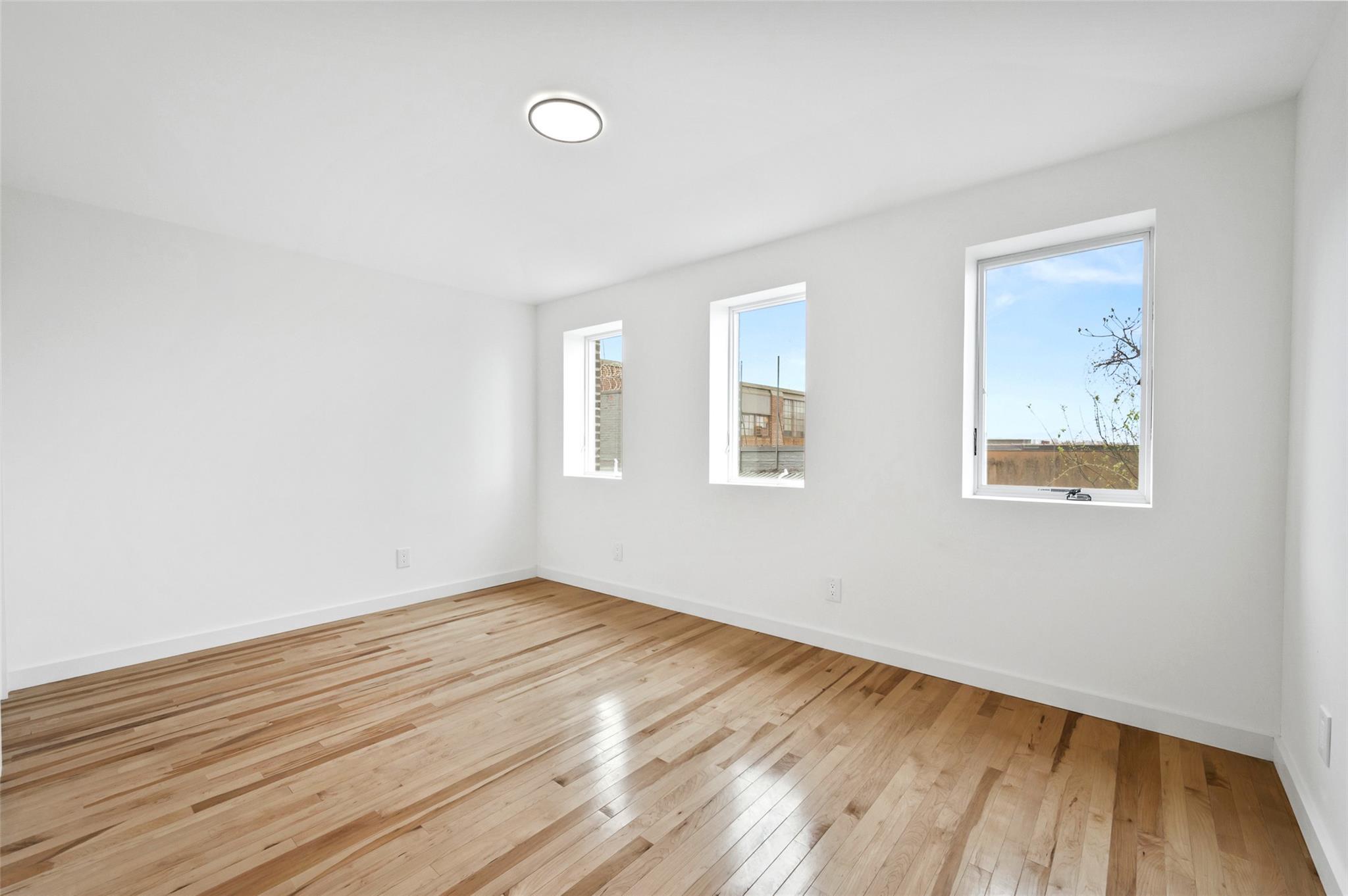 Single Family 59th Place  Queens, NY 11378, MLS-873499-10