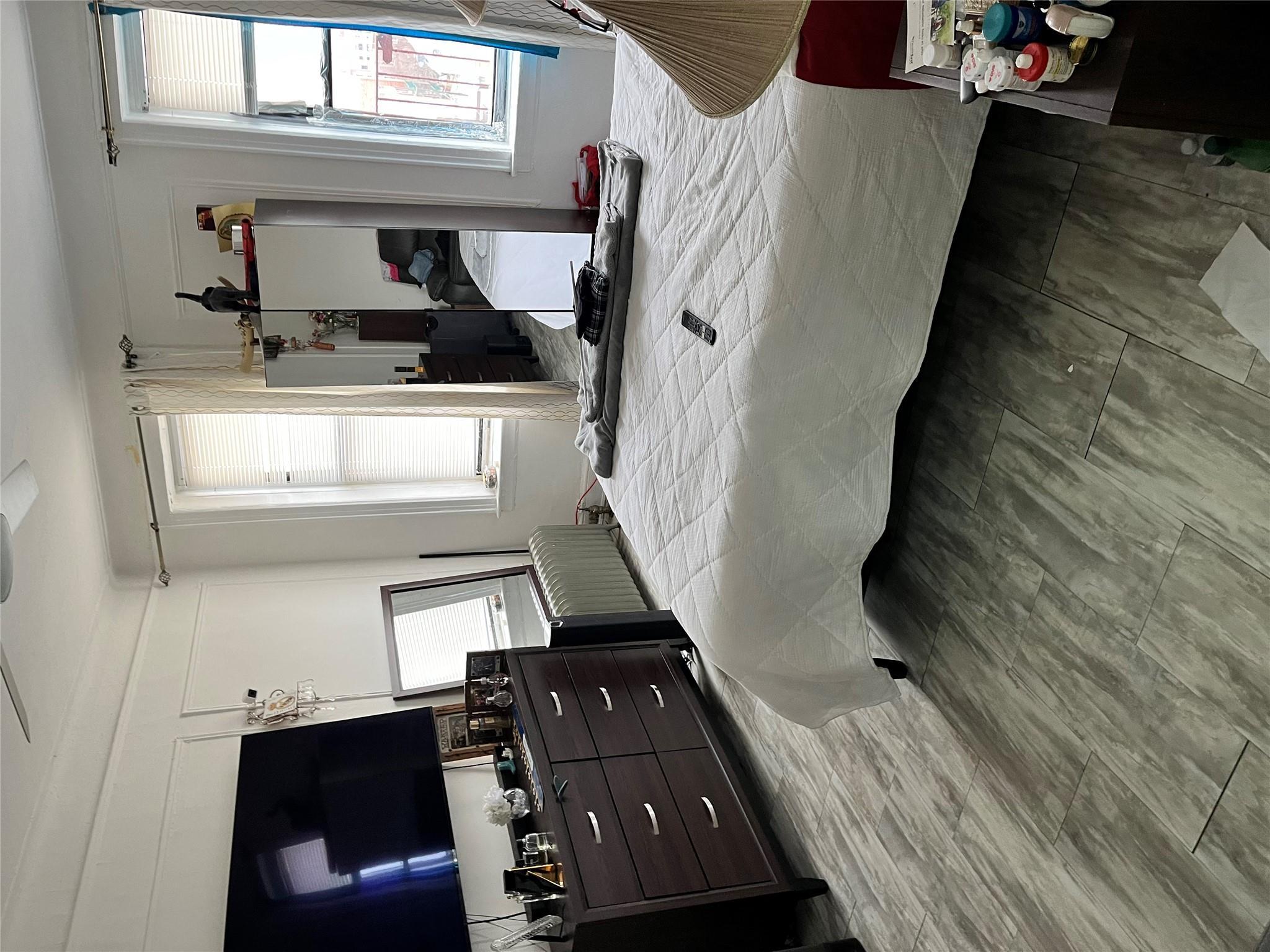 Coop 65th Place  Queens, NY 11377, MLS-875587-9