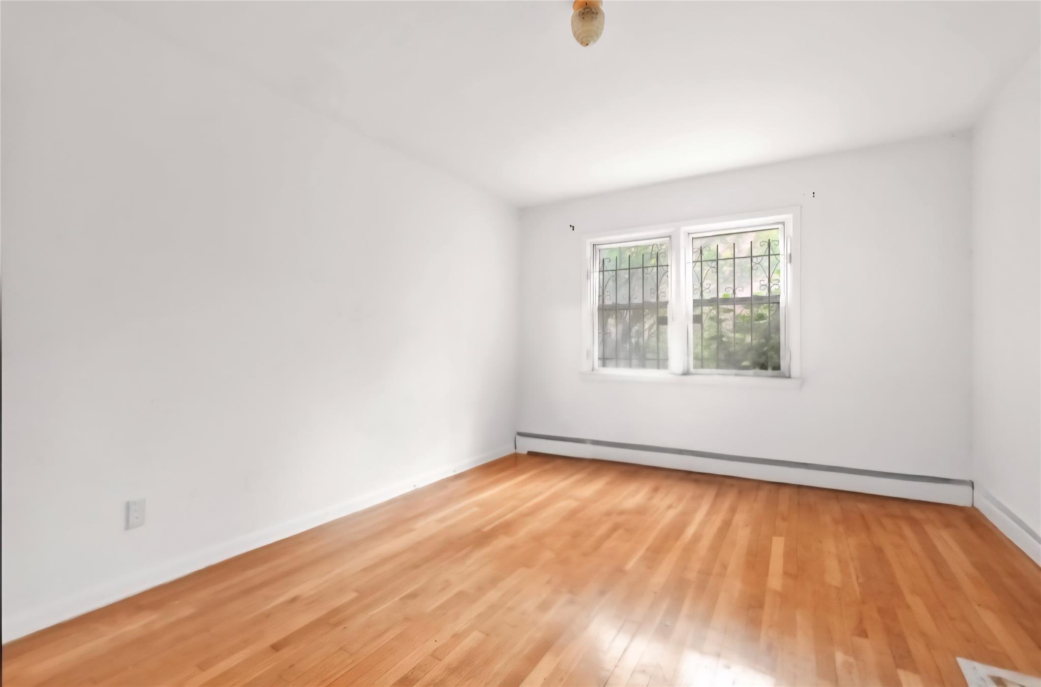 Single Family Roosevelt  Queens, NY 11354, MLS-880867-22