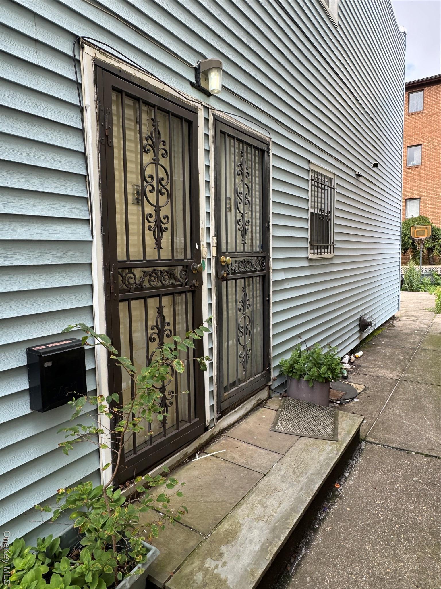 Single Family Borden Queens, NY 11378, MLS-893240-21