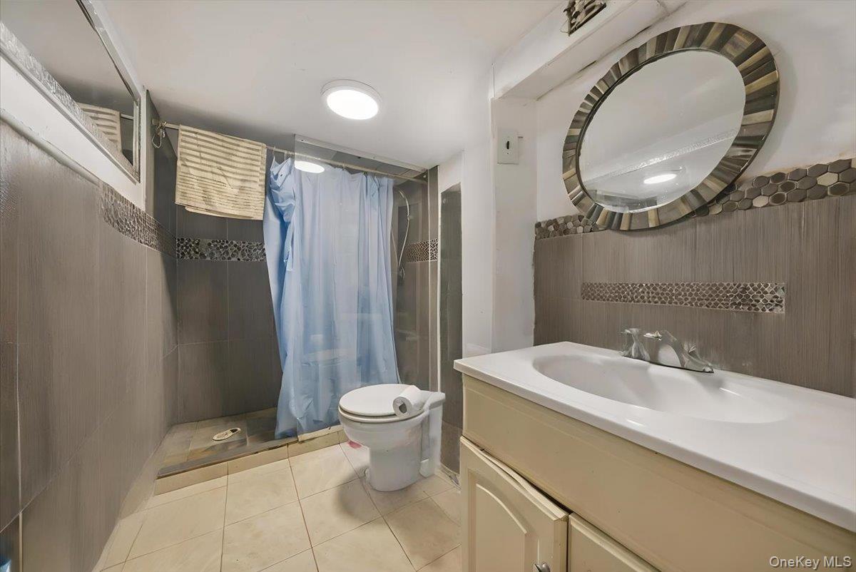 Single Family 87th  Queens, NY 11418, MLS-910020-8