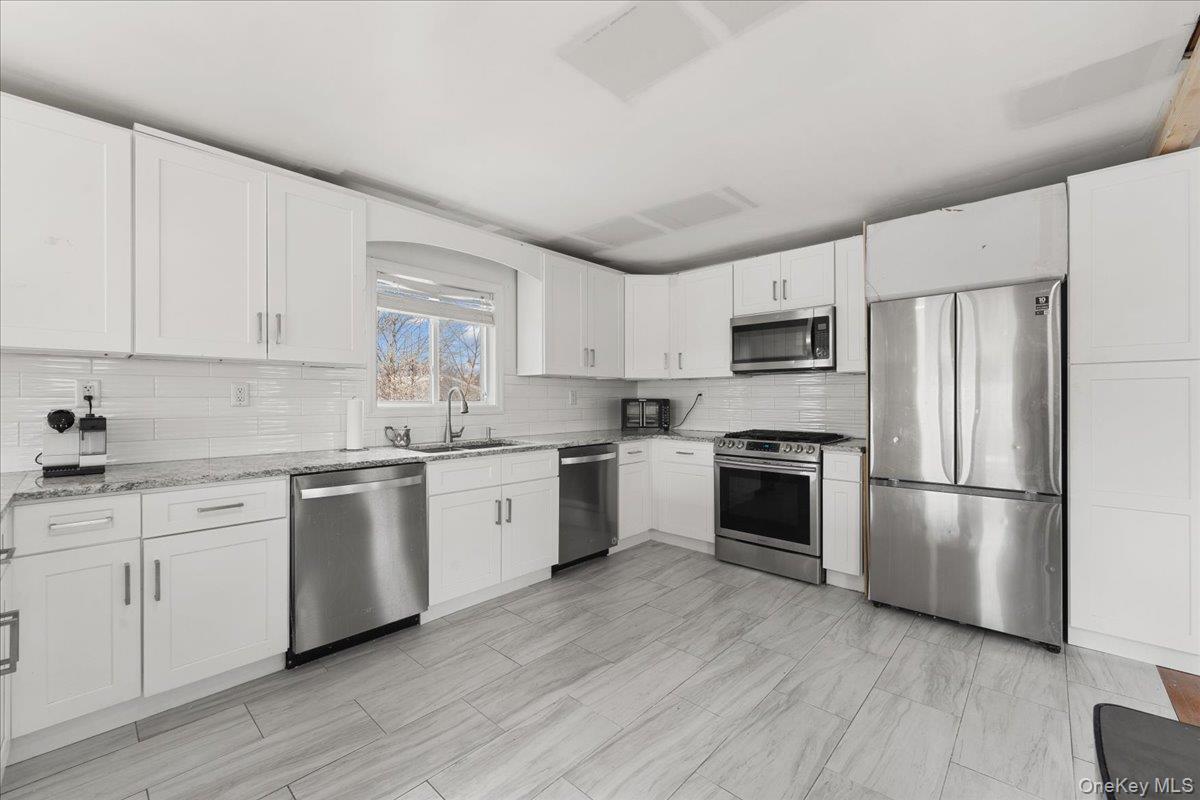 Single Family West Broadway Nassau County, NY 11557, MLS-926728-23