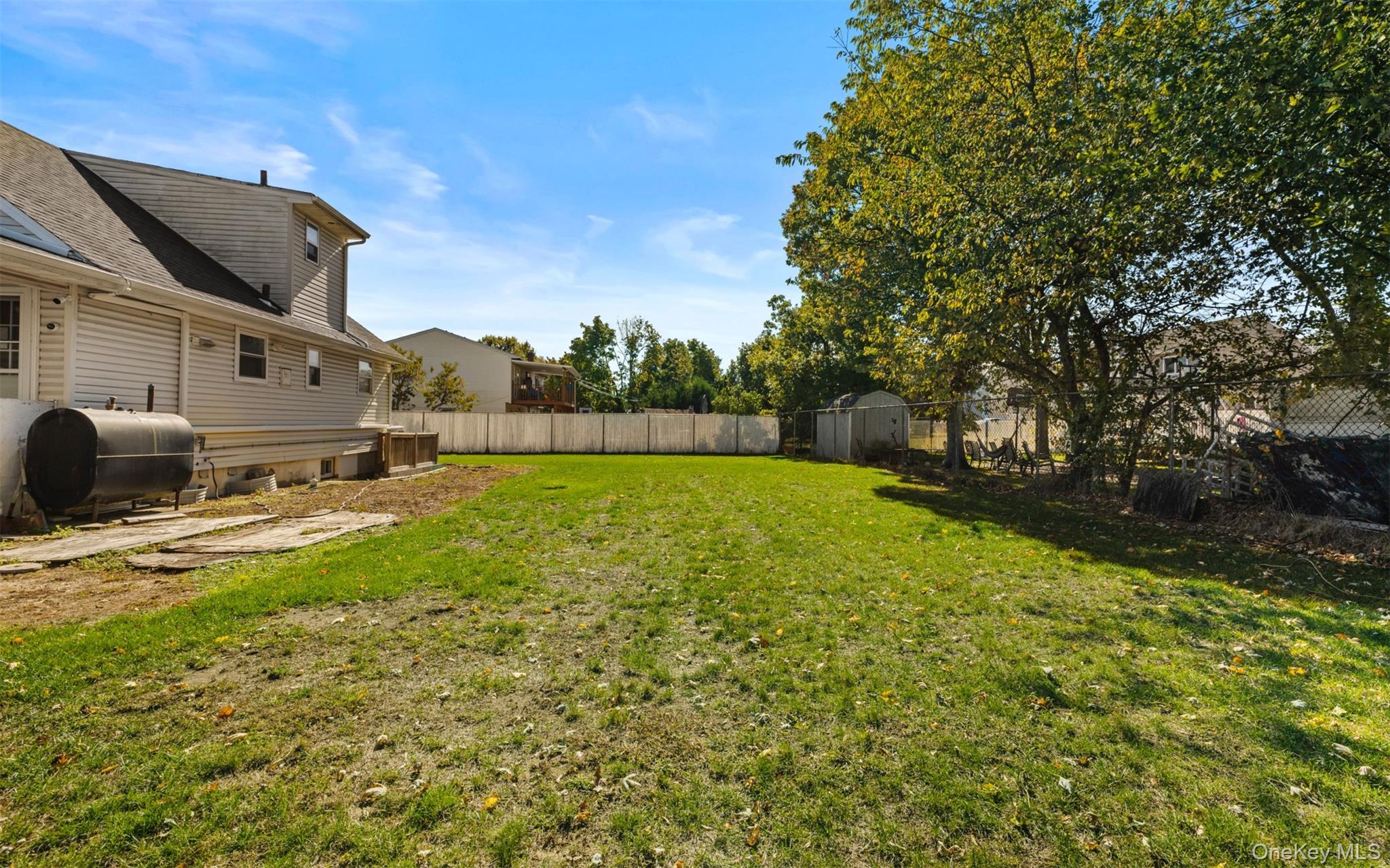 Single Family Wells  Suffolk County, NY 11706, MLS-927594-24