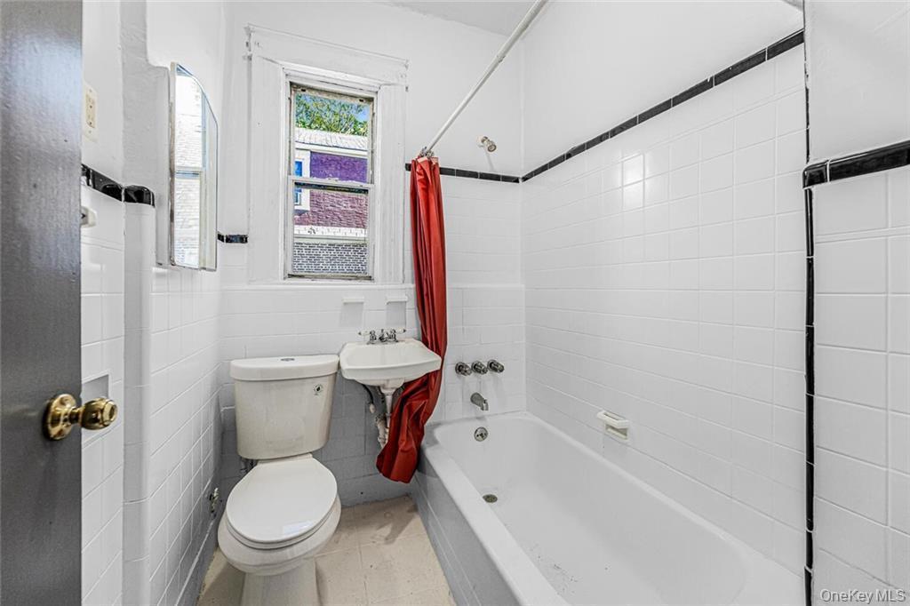 Single Family E 218th  Bronx, NY 10467, MLS-930987-11