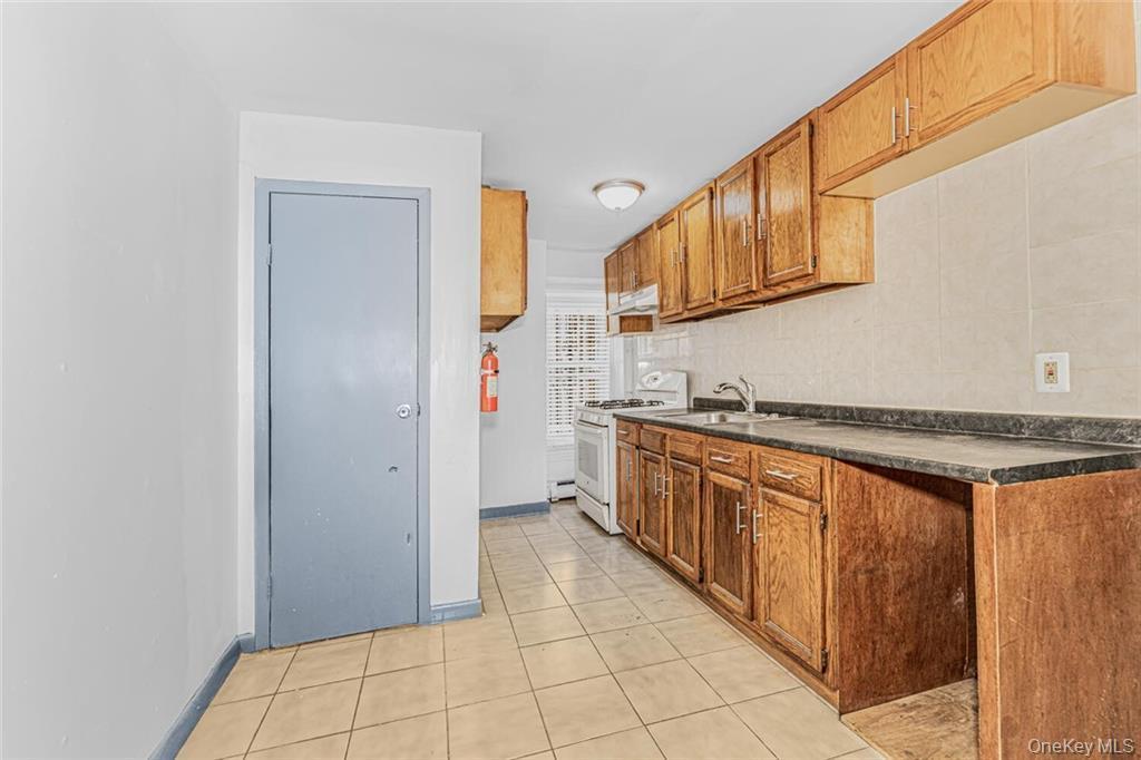 Single Family E 218th  Bronx, NY 10467, MLS-930987-13