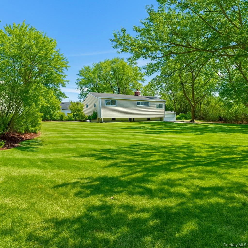 Single Family Sugarwood Suffolk County, NY 11722, MLS-939776-18