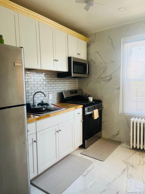 Single Family Van Wyck  Queens, NY 11435, MLS-939850-22