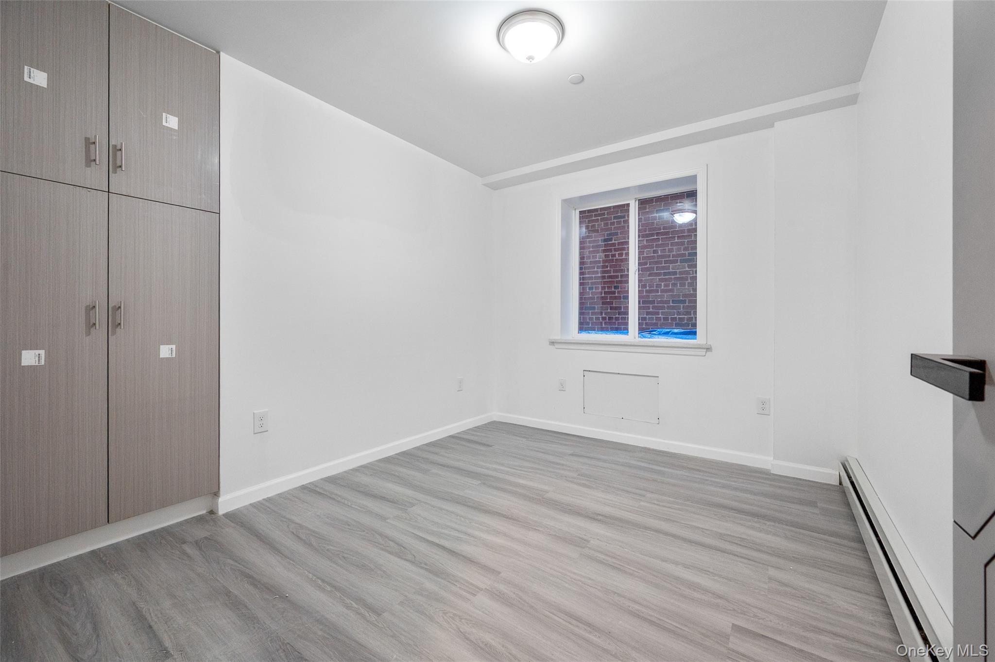 Single Family Clinton  Queens, NY 11378, MLS-940138-12