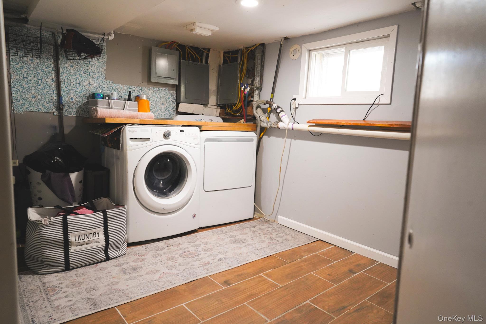 Single Family Everett  Nassau County, NY 11563, MLS-941938-24