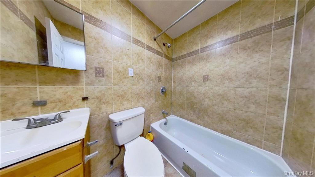 Single Family Brookhaven Queens, NY 11691, MLS-947511-12