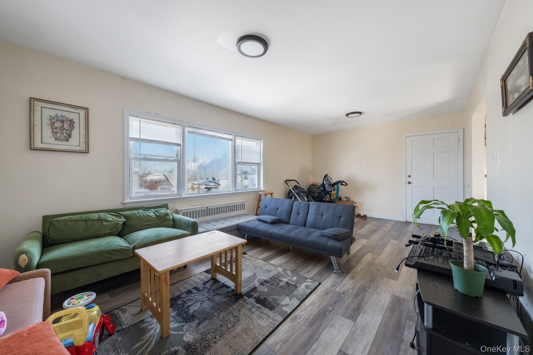 Single Family Curtis  Queens, NY 11369, MLS-957592-11