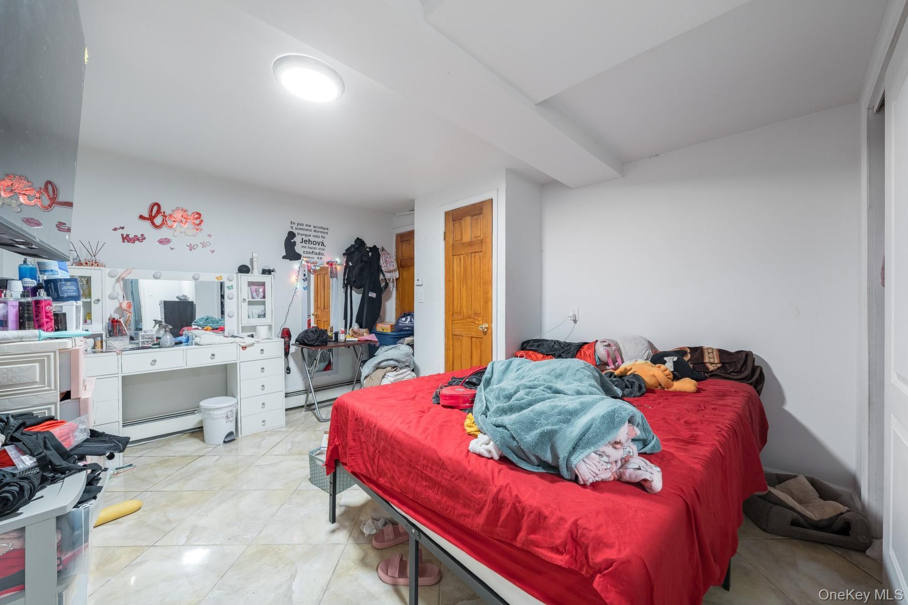 Single Family Curtis  Queens, NY 11369, MLS-957592-24