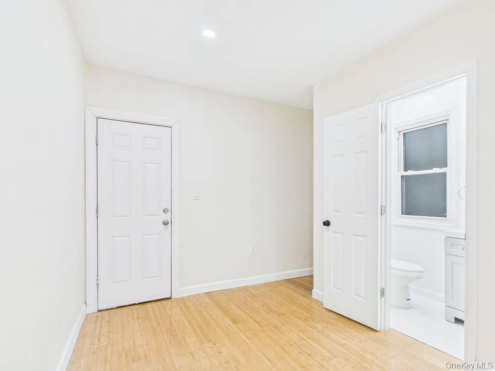 Single Family Curtis  Queens, NY 11369, MLS-960871-21