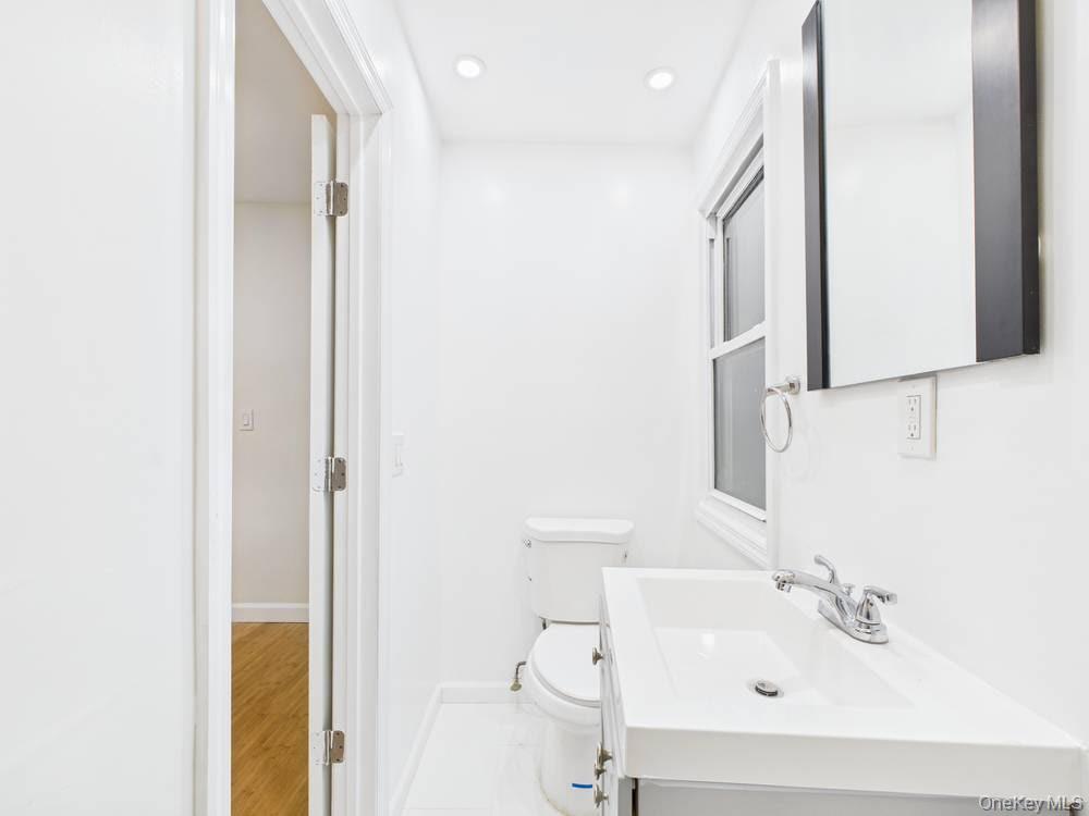 Single Family Curtis  Queens, NY 11369, MLS-960871-24