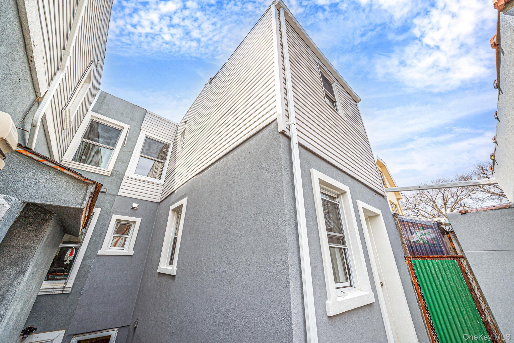 Single Family Mcintosh  Queens, NY 11369, MLS-965413-29