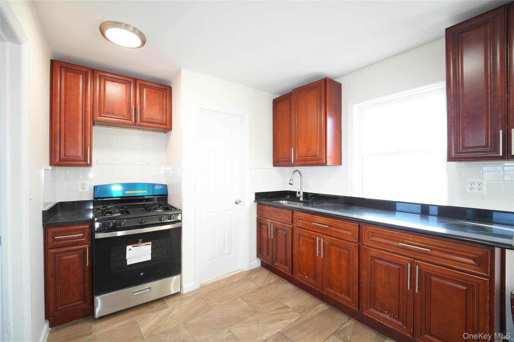 Single Family 55th Queens, NY 11378, MLS-969339-2