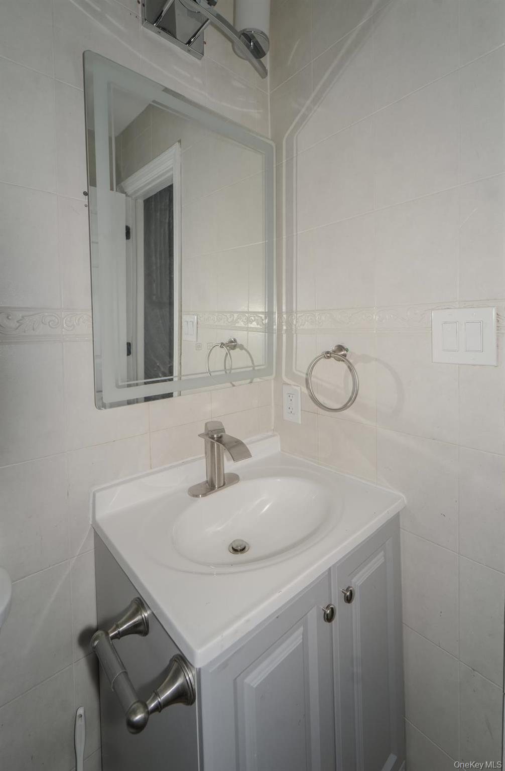 Single Family Miller  Nassau County, NY 11520, MLS-969427-22