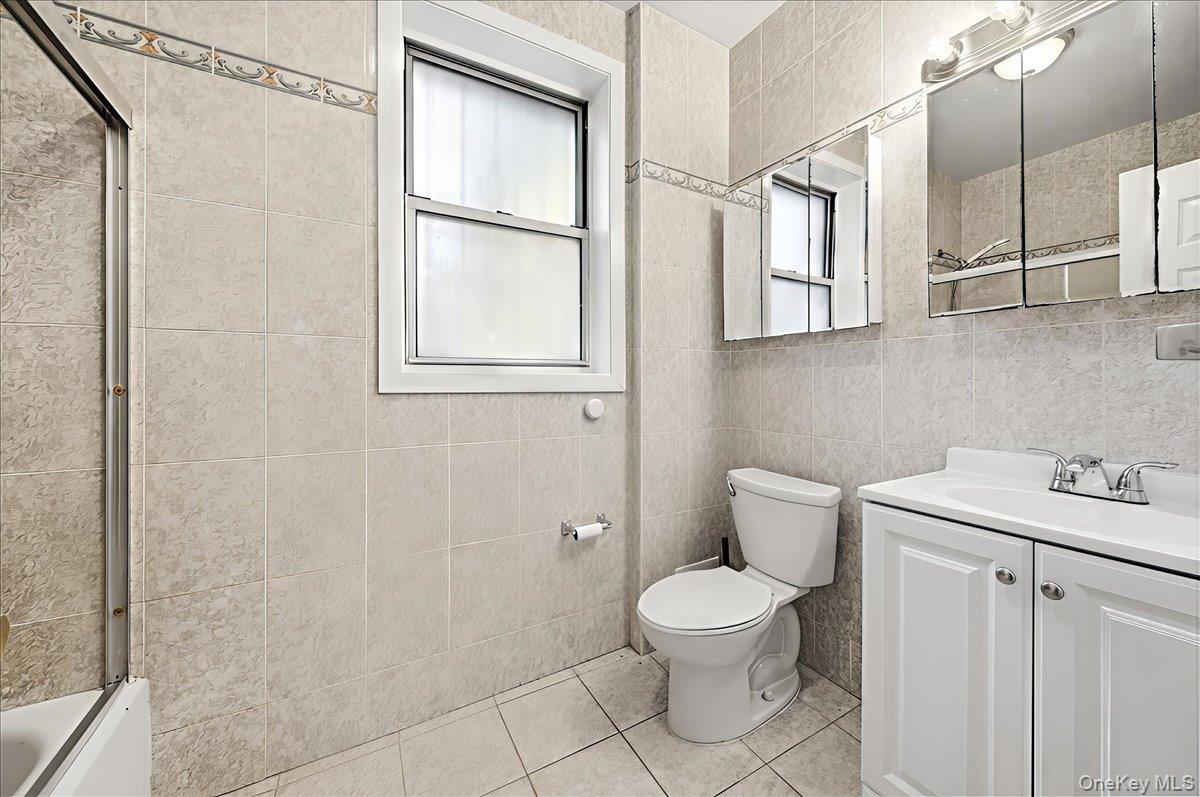 Single Family Holland  Bronx, NY 10467, MLS-970381-10