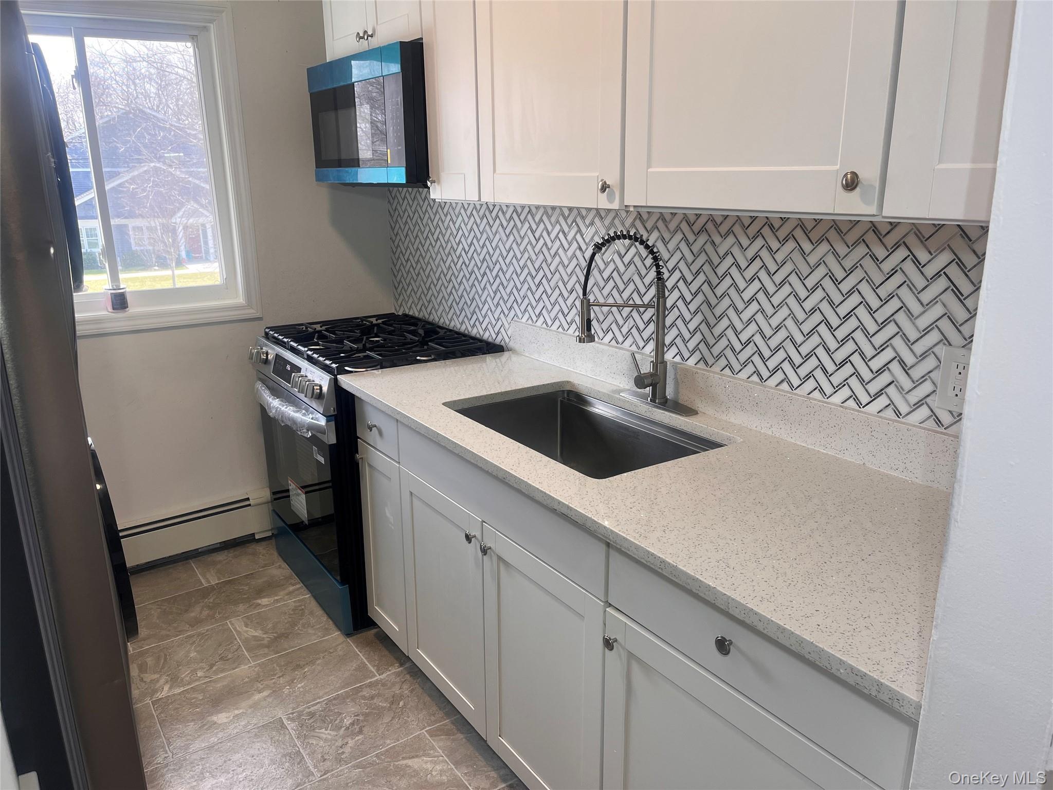 Condo Adams Suffolk County, NY 11722, MLS-974424-6