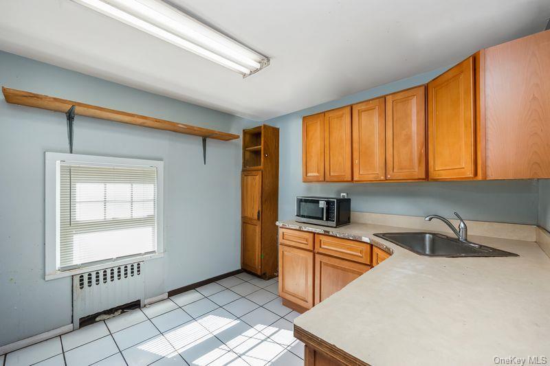 Single Family Mackey Avenue  Nassau County, NY 11050, MLS-977186-11