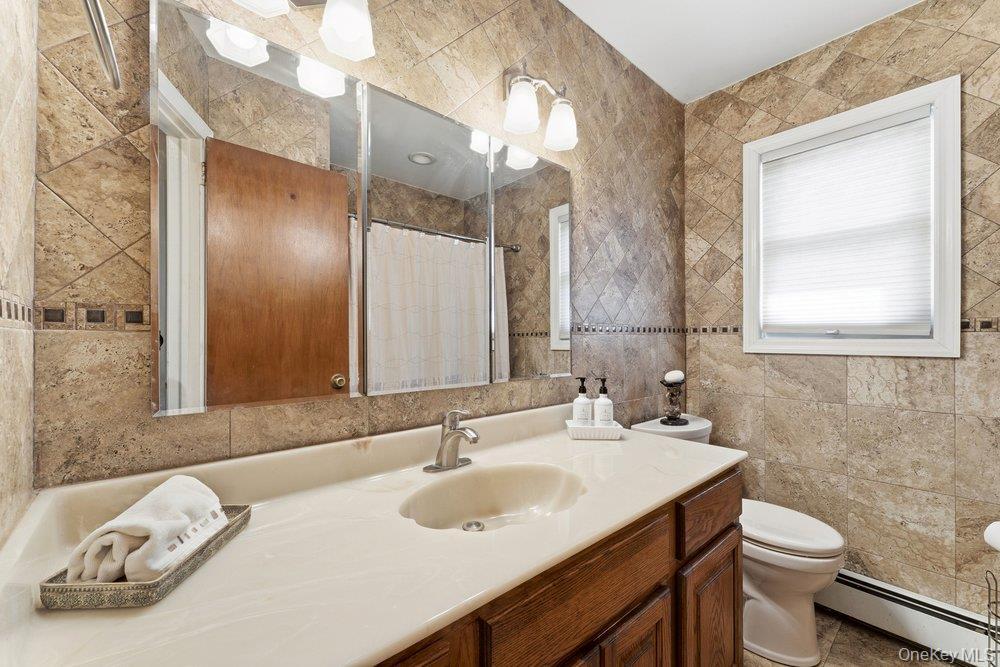 Single Family Woodlawn  Nassau County, NY 11581, MLS-977910-11